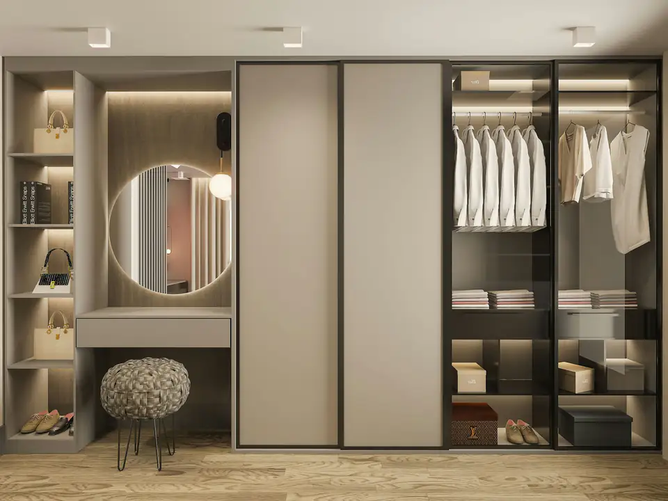 Lit fitted wardrobe wall with vanity desk | Fitted wardrobes Newcastle Luxury fitted wardrobe wall with lit open shelving, glass doors and a built-in vanity desk, a fitted wardrobe idea for Newcastle homes